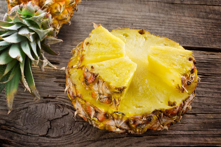 Organic pineapple. Slice and chunk