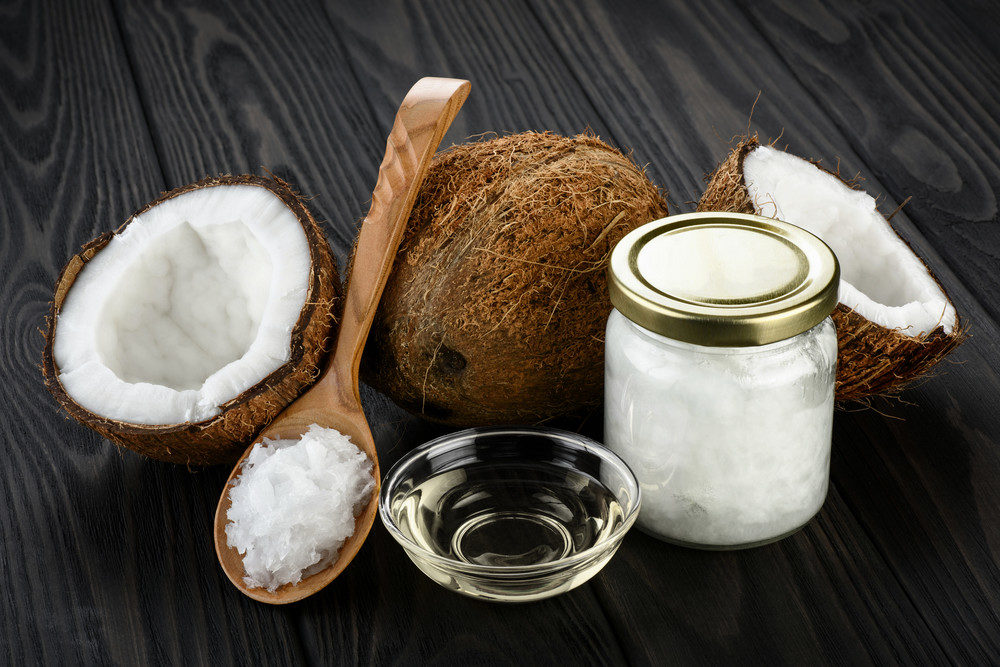 Coconut and coconut oil in jar